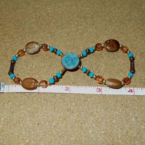 Antique Torquoise Infinity barrette made and supplied by Longhaired Jewels