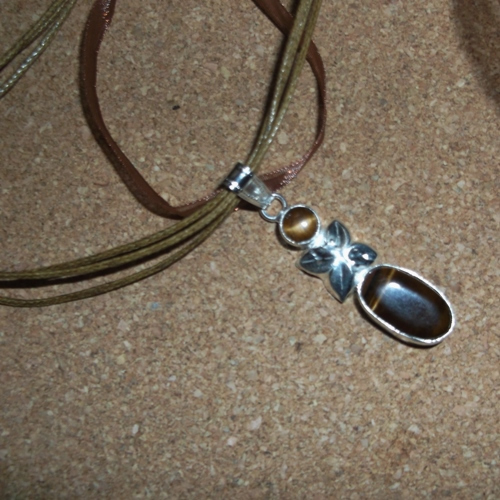 Tigers Eye in silver mounting on a necklace - supplied by Longhaired Jewels