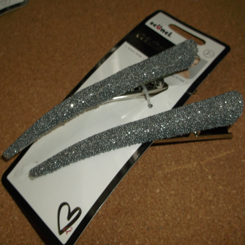 Scrunci silver colour curved beak clip supplied  by Longhaired Jewels